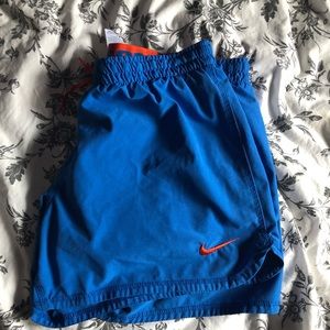 Blue nike shorts with tight under shorts inside